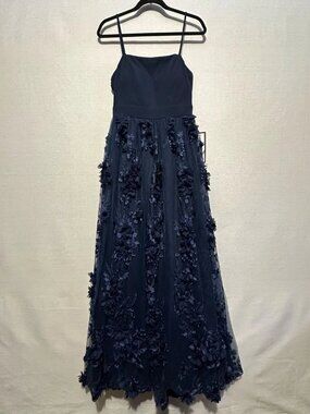 A light blue decorative Trixxi women's dress with floral patterns